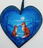Foxes by moonlight