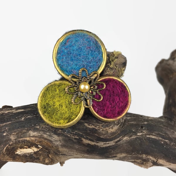 Brooch, brass circles with needle felted centre, random colour