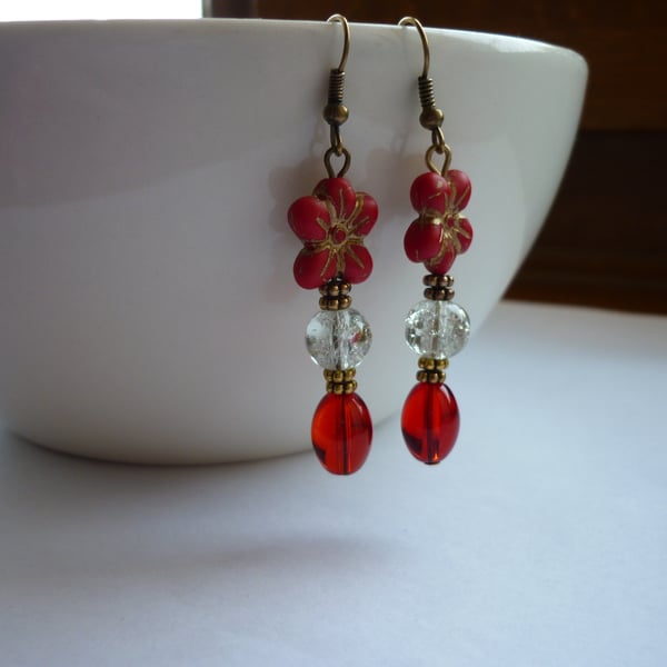 RED, CRYSTAL AND BRONZE FLOWER DANGLE EARRINGS.