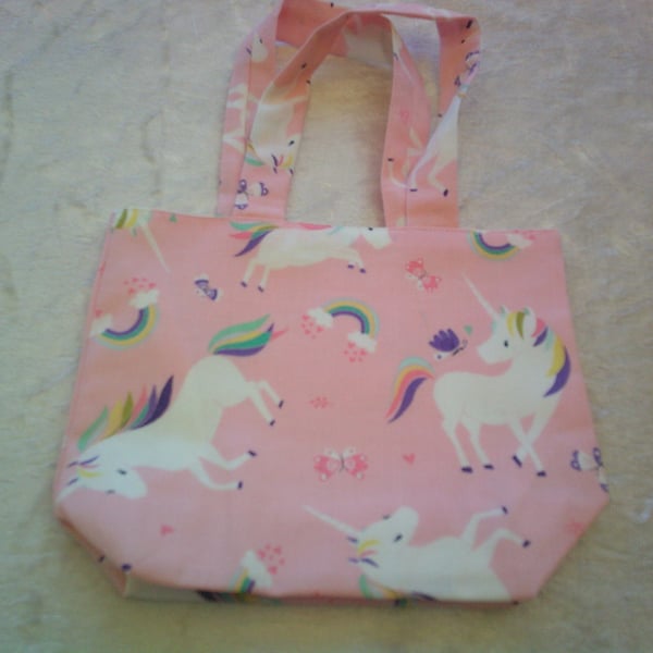 Unicorns and Rainbows on a Pale Pink Background Fabric Handbag