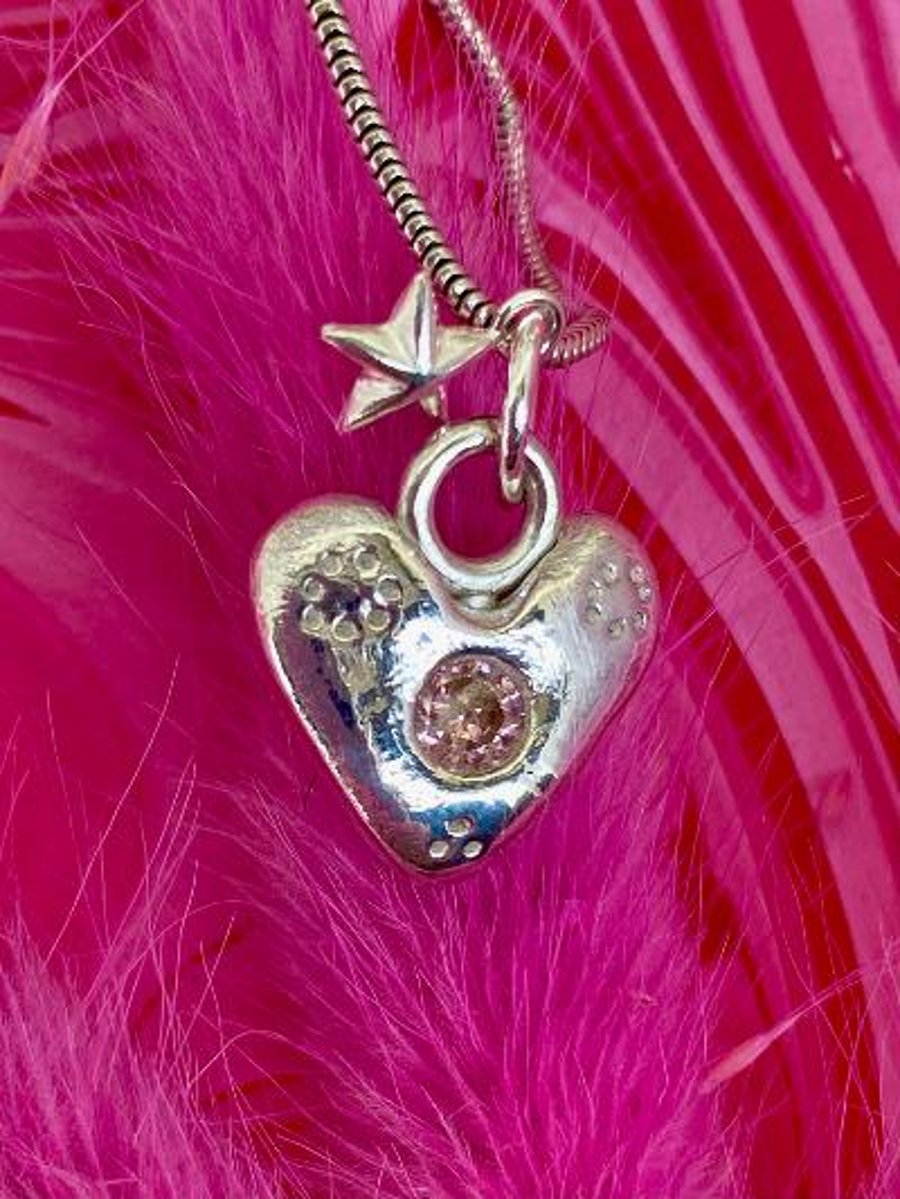 Solid silver heart pendant necklace with pink gemstone