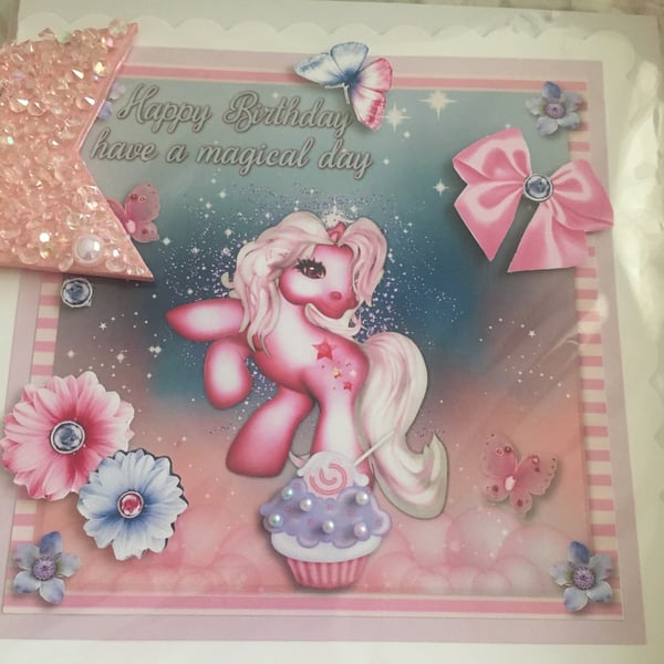 Pink unicorn Happy Birthday card with a sparkly pink hanging decoration