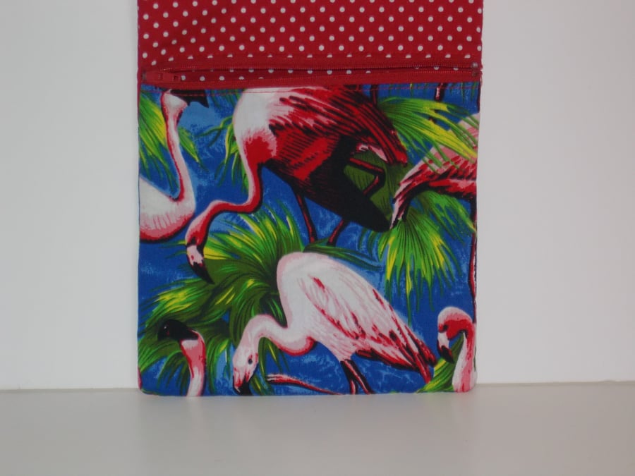 Cross over body bag with pink flamingos print.