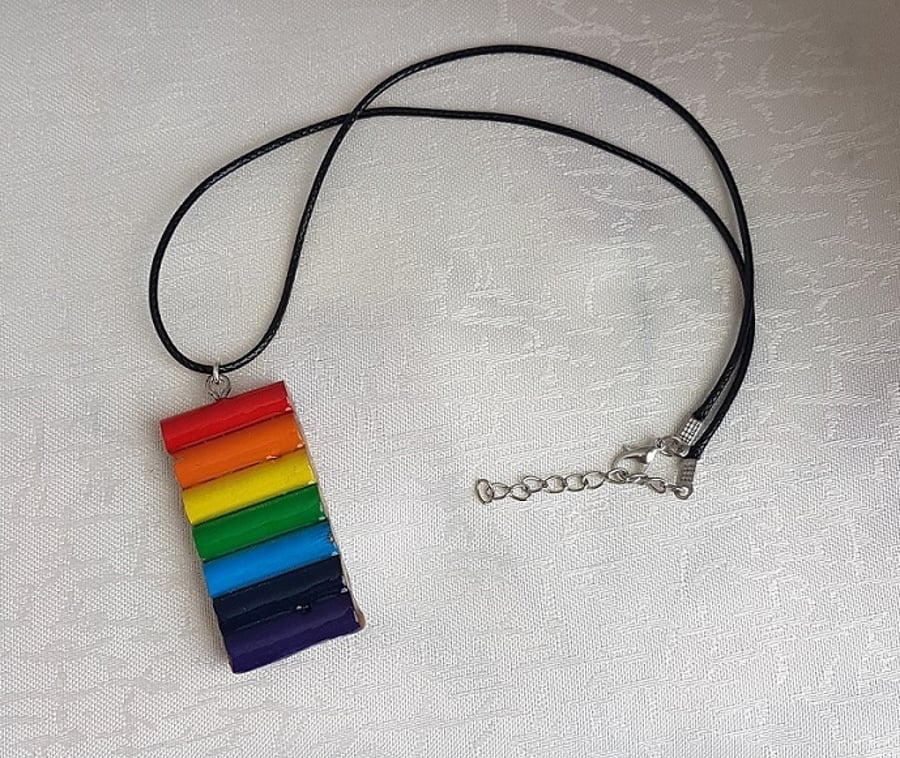 Beautiful Rainbow Wooden Pendant - On black cord.