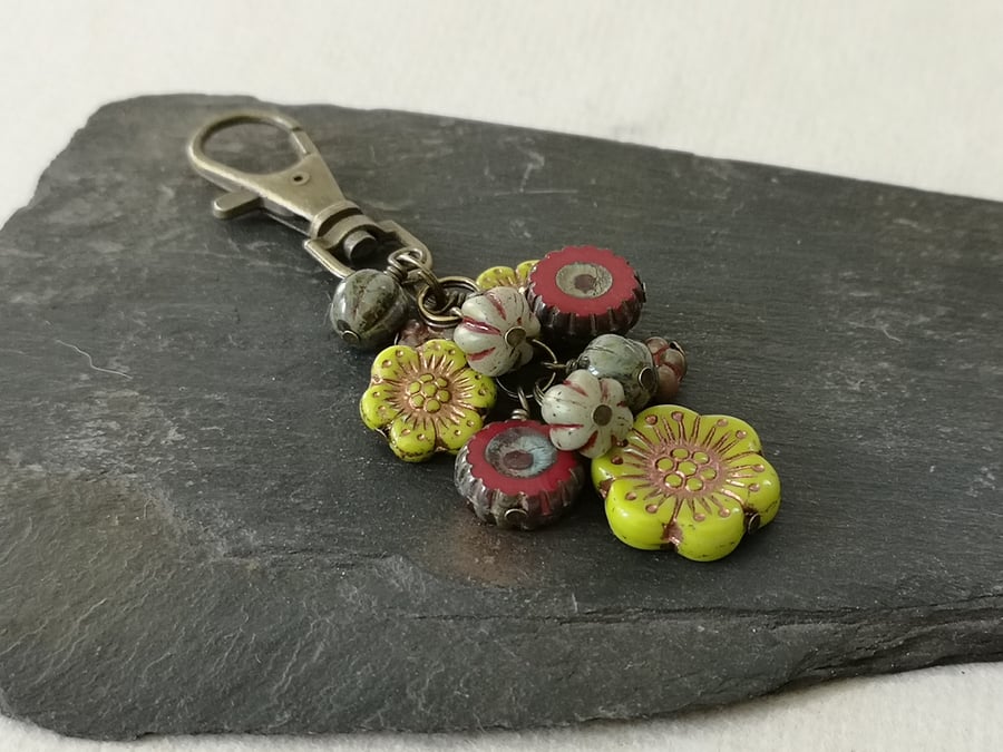 Red, green and antique gold bag charm with Czech glass beads and flowers
