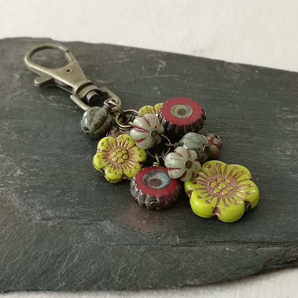 Red, green and antique gold bag charm with Czech glass beads and flowers