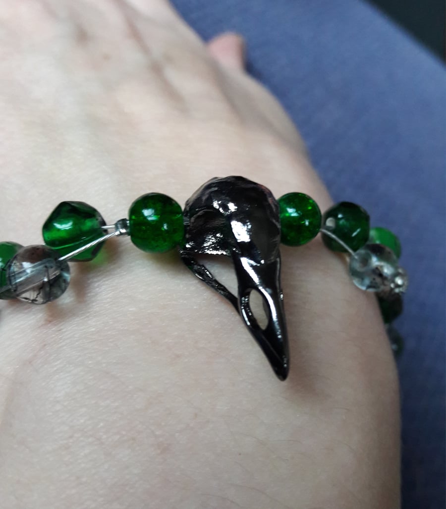 Gothic Bird skull charm bracelet with green beads. Gift boxed. 