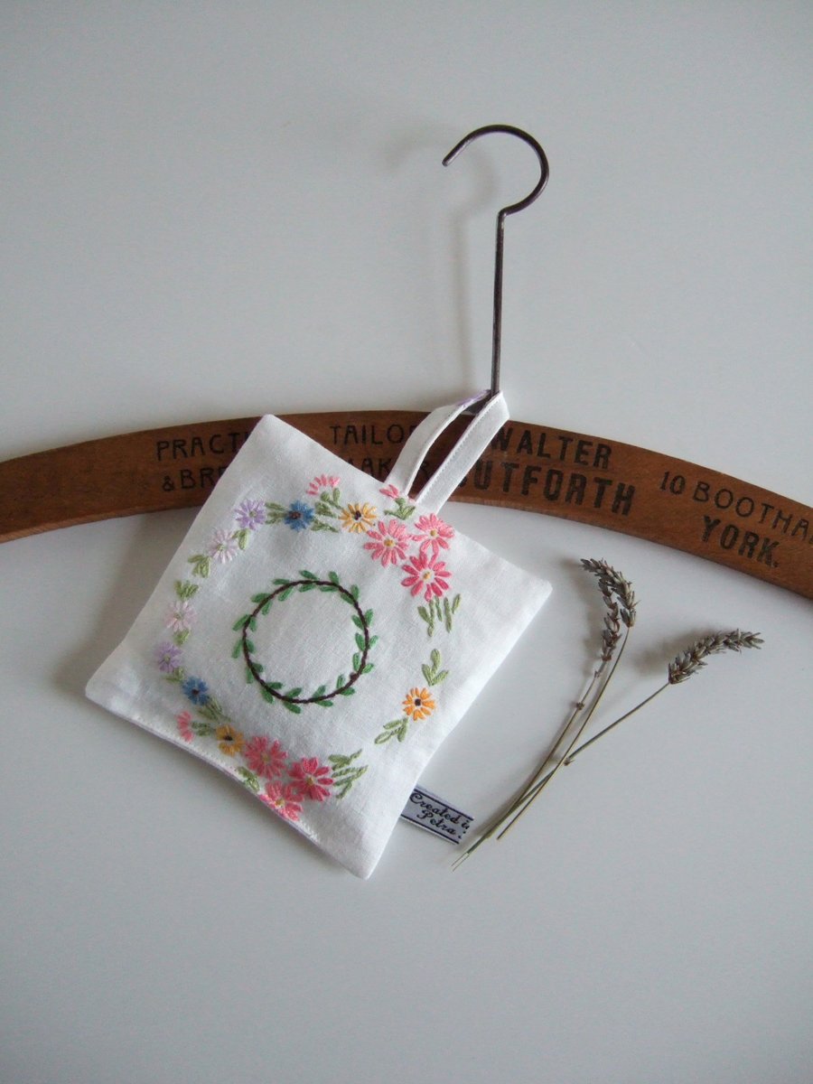 Lavender bag, with circular vintage floral embroidery.