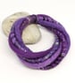 Felted cord bracelet in shades of purple