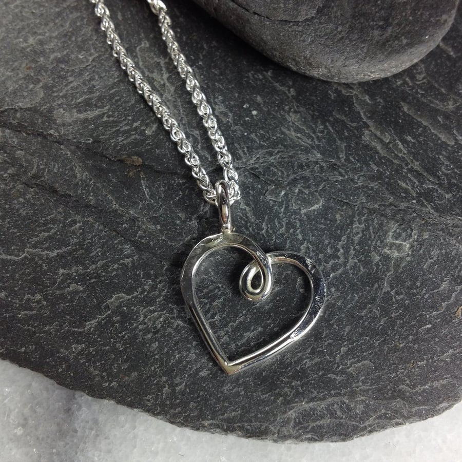 Silver heart pendant on silver chain