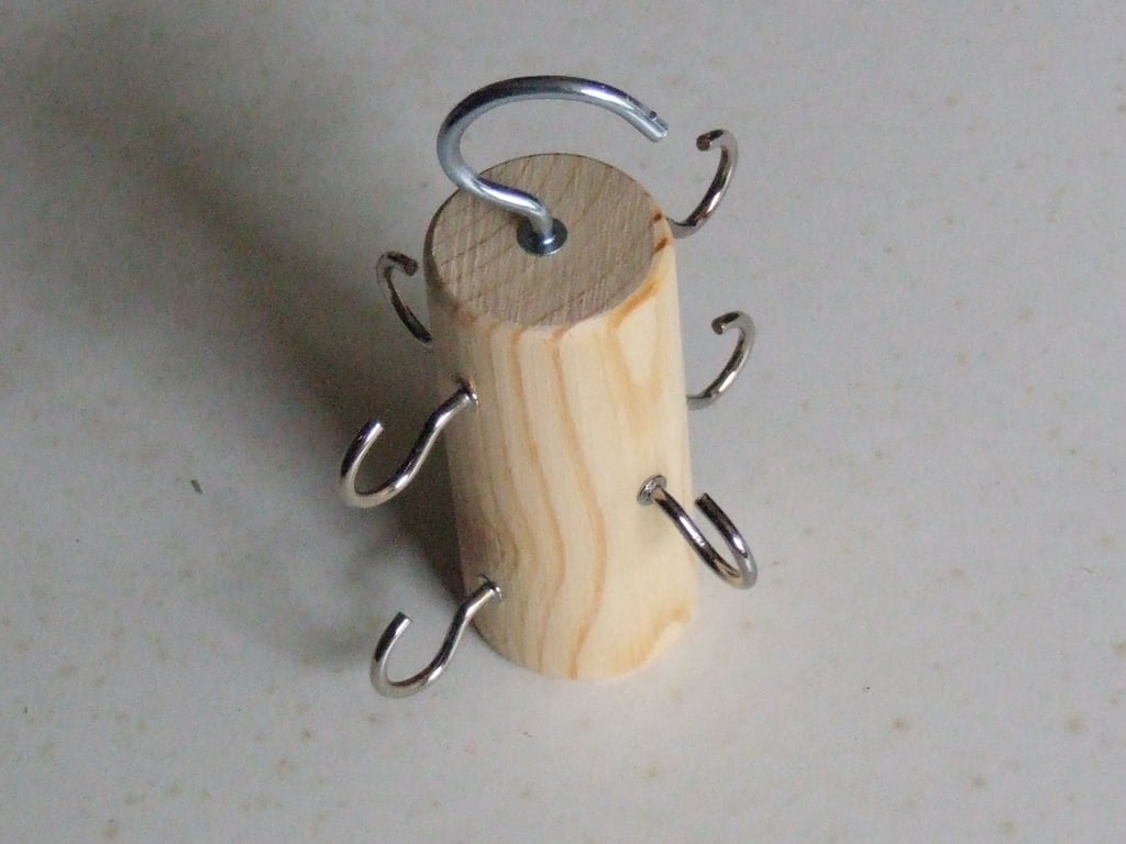 Belt holder or hanger for hanging belts in a bedroom wardrobe, ideal space saver