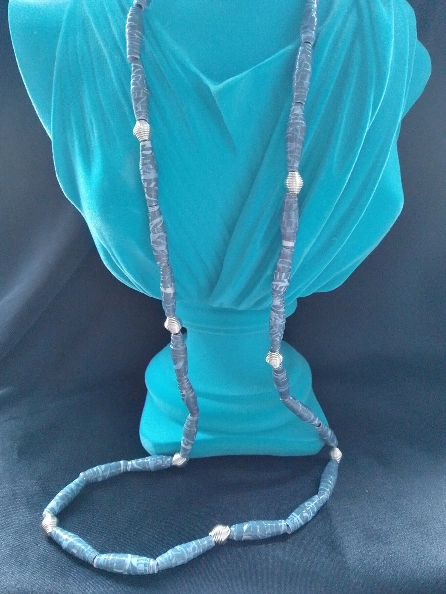 Handmade denim blue varnished paper and silver coloured wire bead necklace