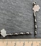 Sterling silver dangly flower stud earrings with haematite stones - Image 2