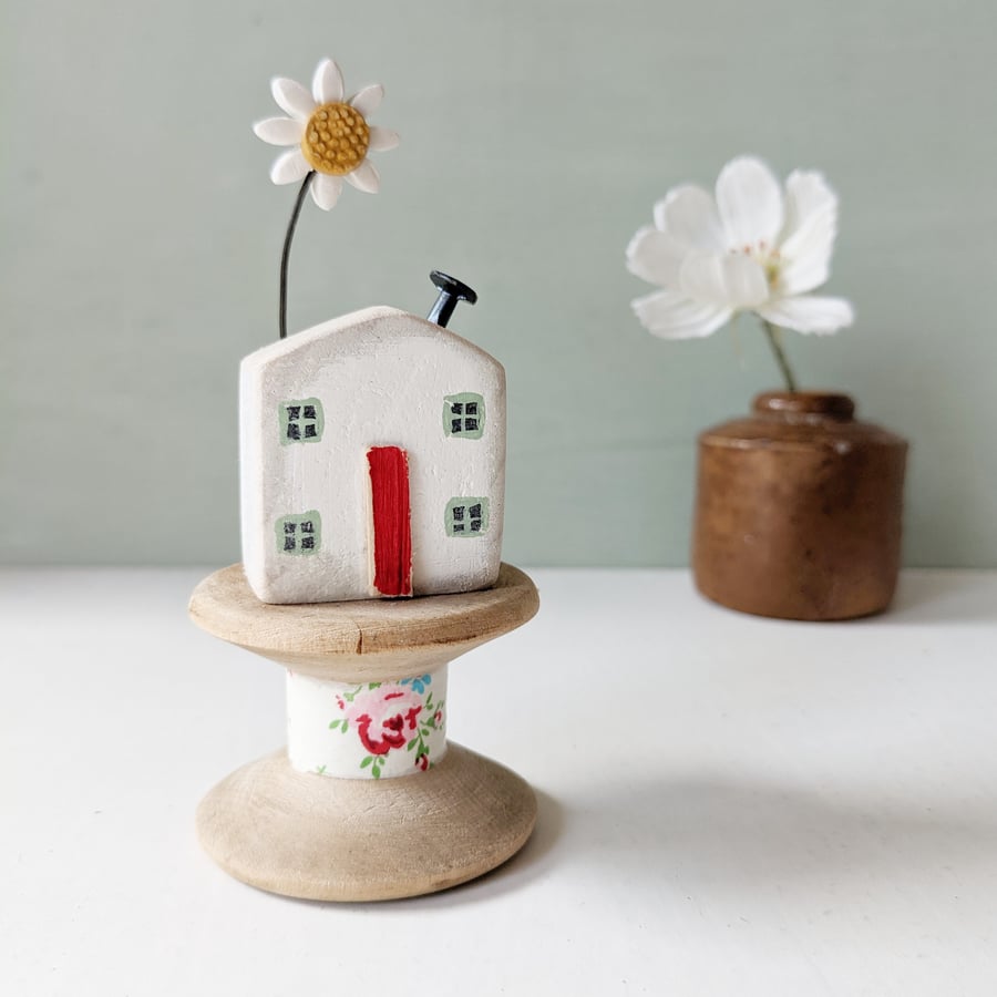 Wooden House on a Vintage Floral Bobbin with Clay Daisy