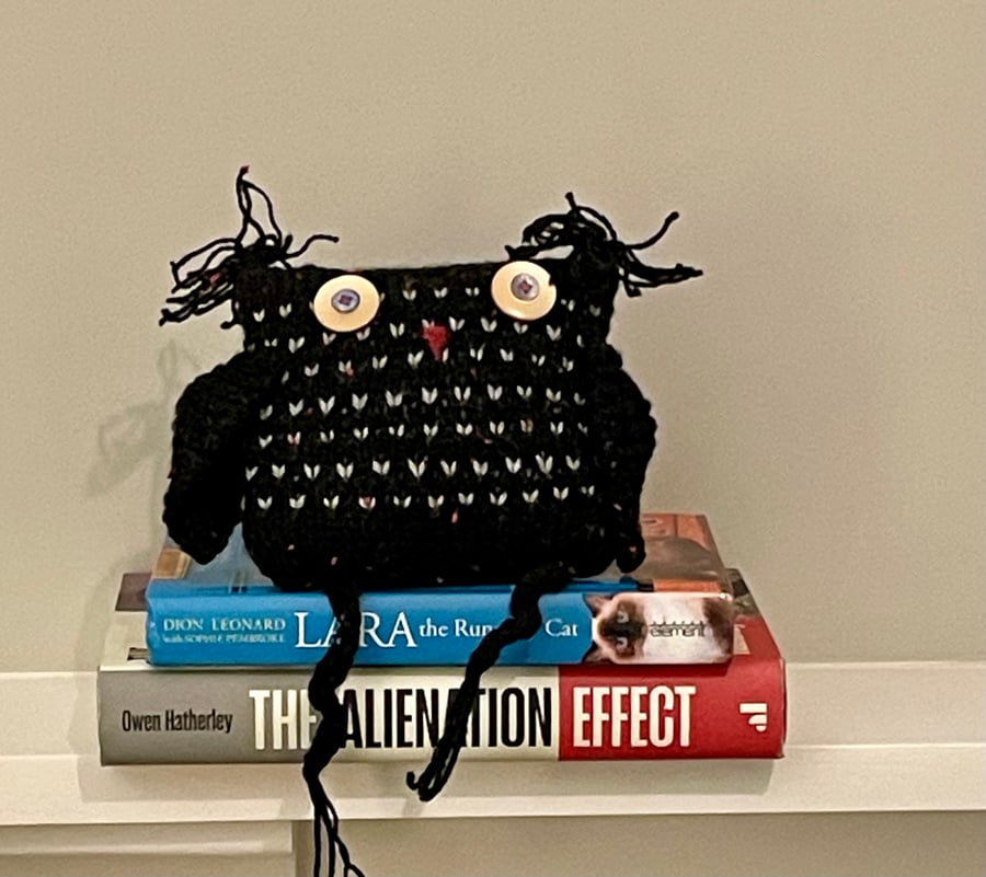 Knitted black owl ornament 