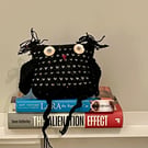 Knitted black owl ornament 