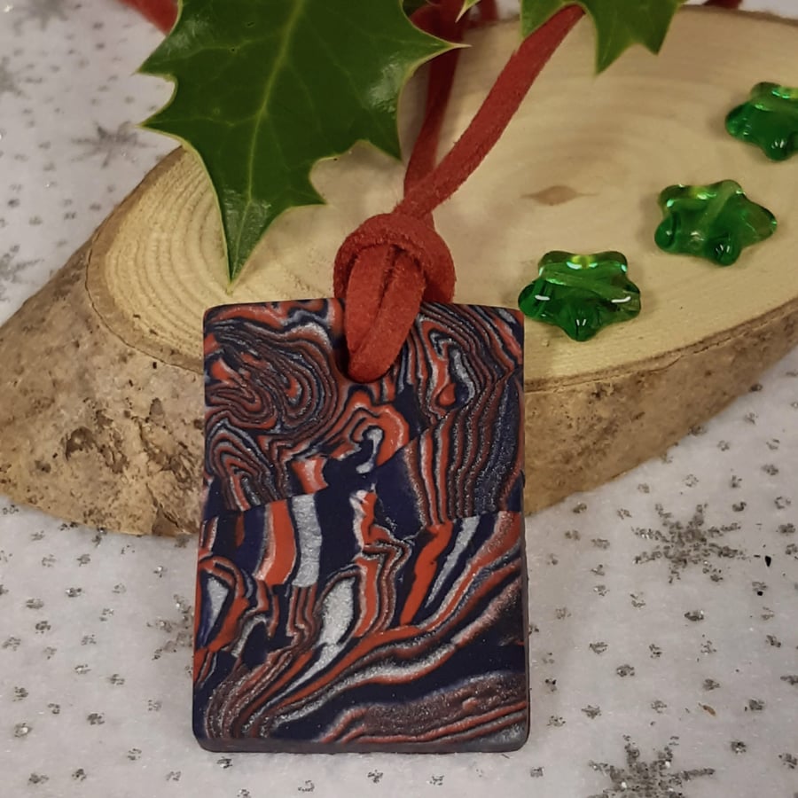 Red, blue and silver rectangular pendant