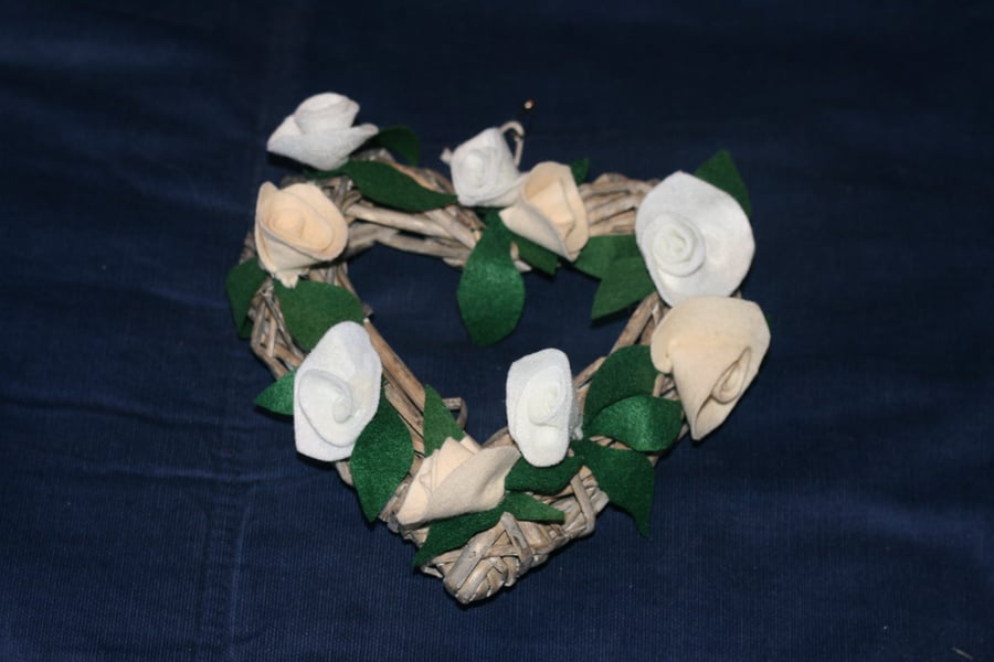 Wicker heart shaped wreath with cream and white felt roses