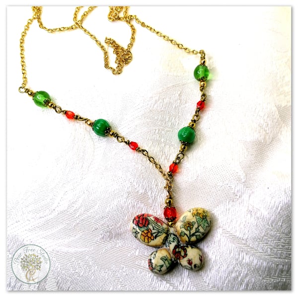 Handmade Butterfly necklace long with red and green beads