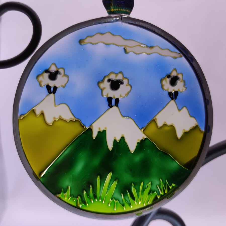 Handmade glass painted window hanging or Christmas tree bauble