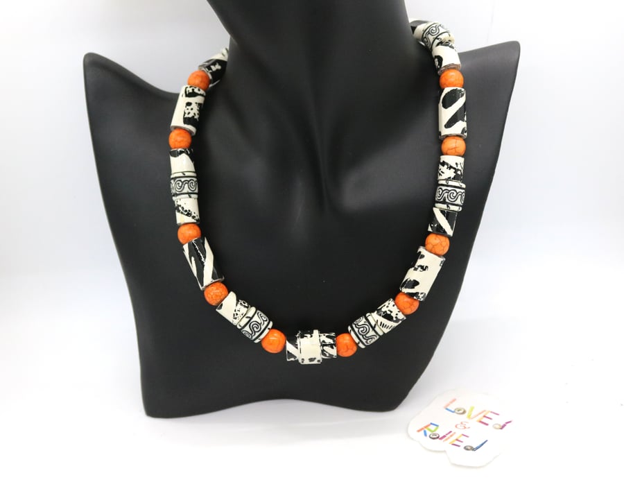 Africa inspired paper beaded collar black white and orange necklace
