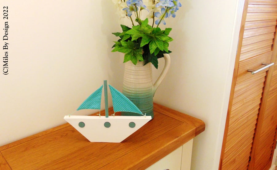 Wooden Boat With Sails