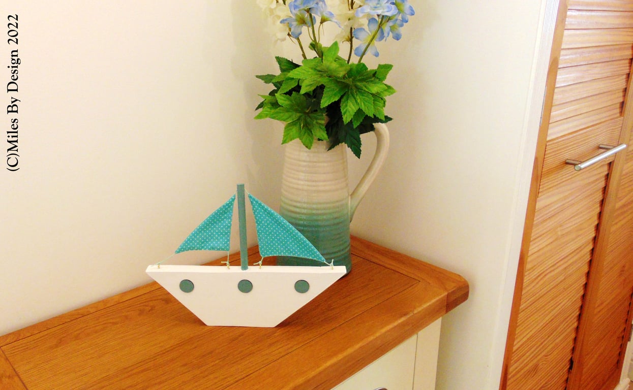 Wooden Boat With Sails