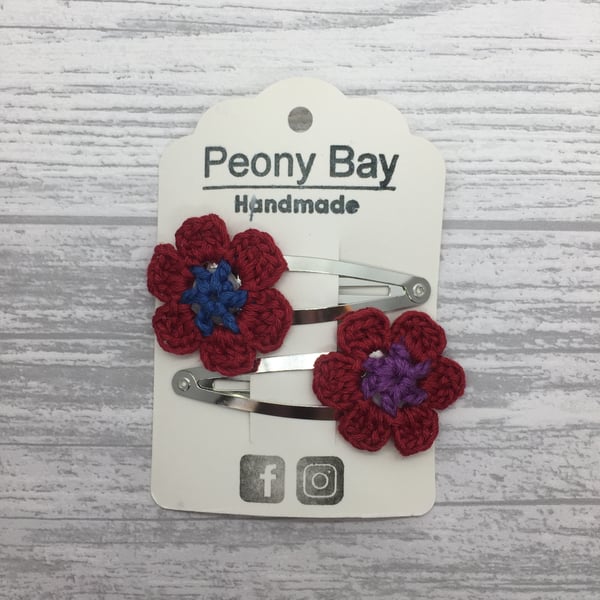 Hair clips with mis-matched crocheted flowers