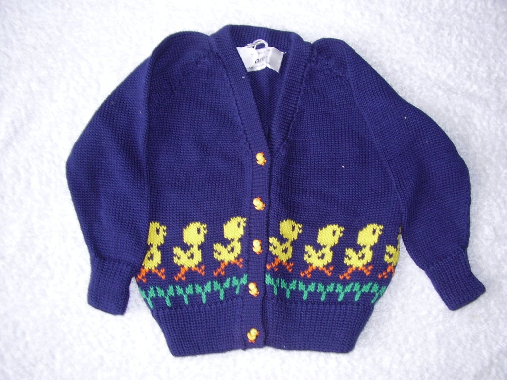 Chick cardigan with chicks round the bottom and chick buttons