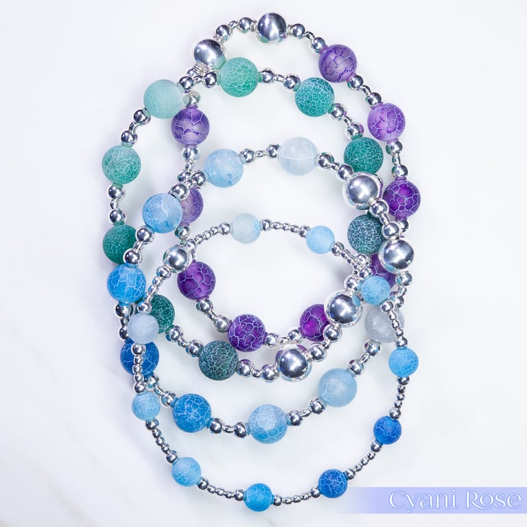 Bracelet sterling silver and crackle glass in blues stretch beaded handmade