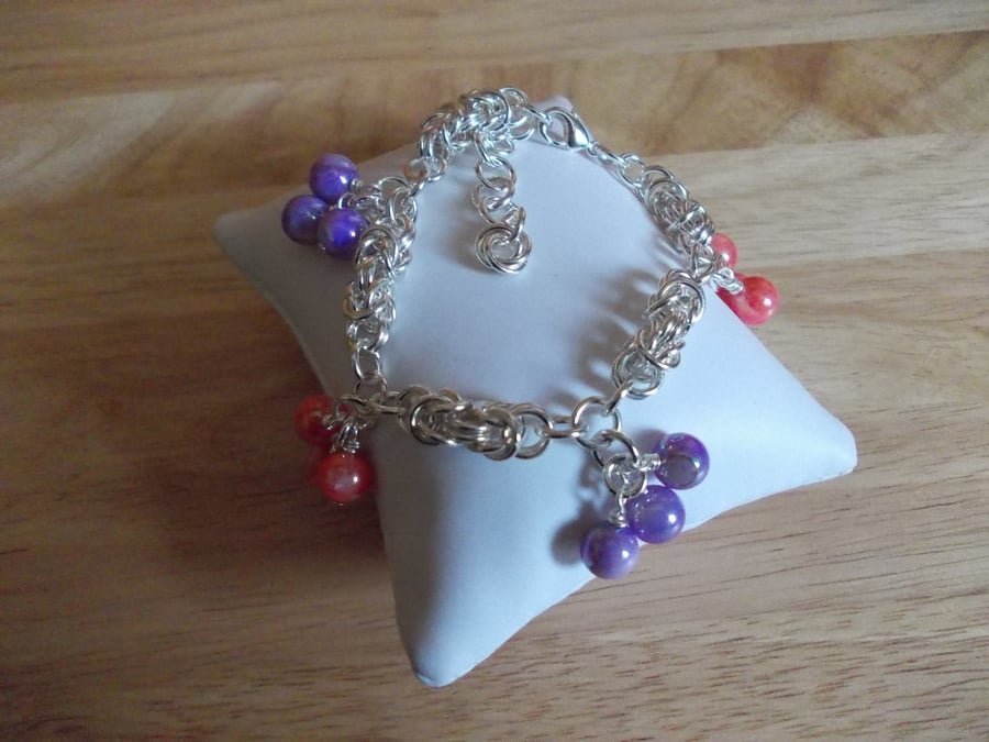 Pink and purple shell byzantine charm bracelet