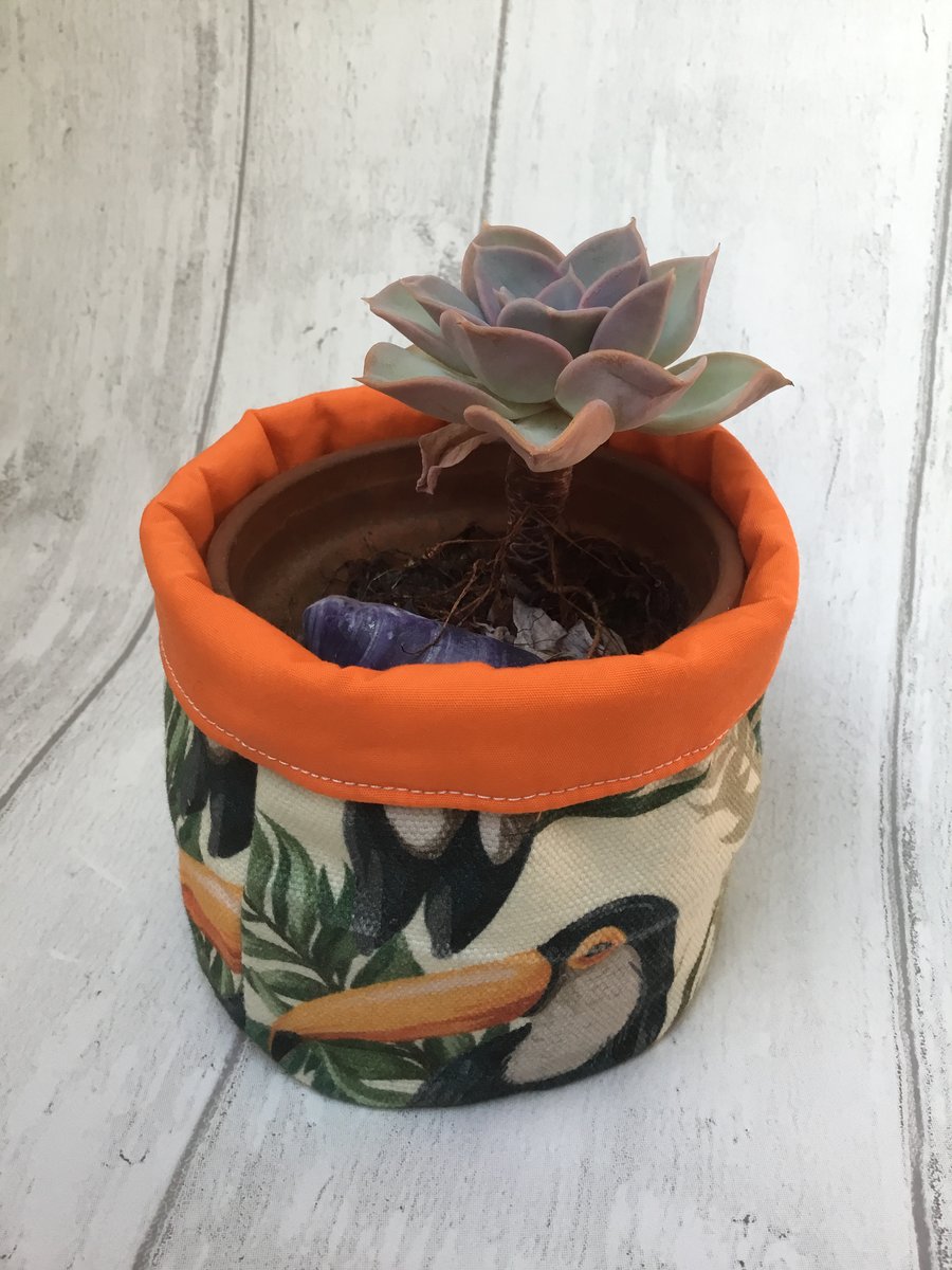 Small fabric basket: plant pot, cosmetics etc Toucans with orange