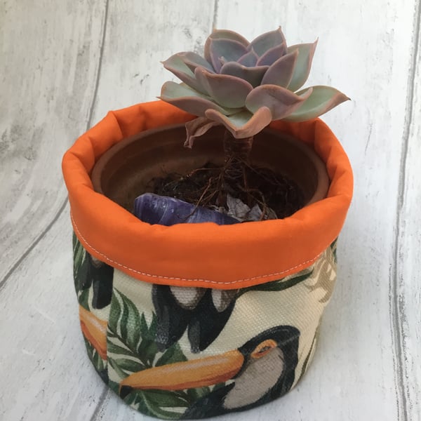 Small fabric basket: plant pot, cosmetics etc Toucans with orange