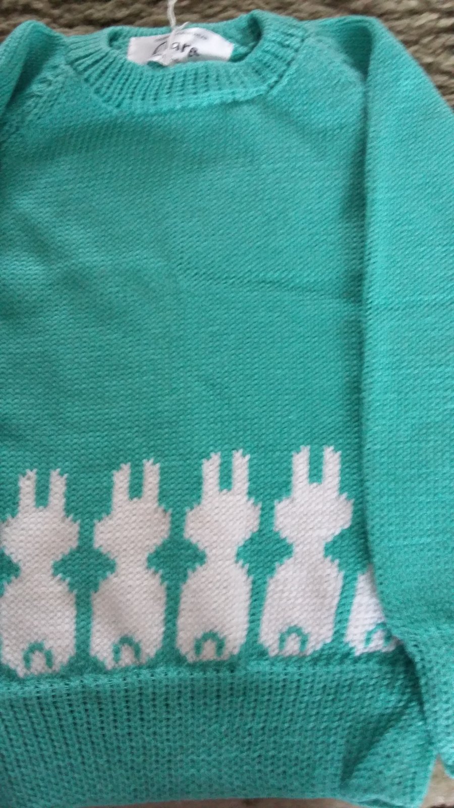 Jumper with little rabbits round the bottom