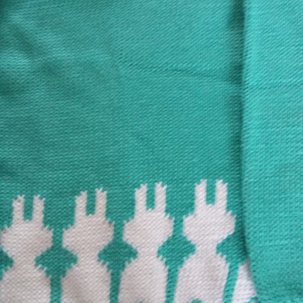 Jumper with little rabbits round the bottom