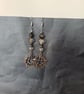 Beaded silver pentacle dangle earrings with icy leaves  - Image 5