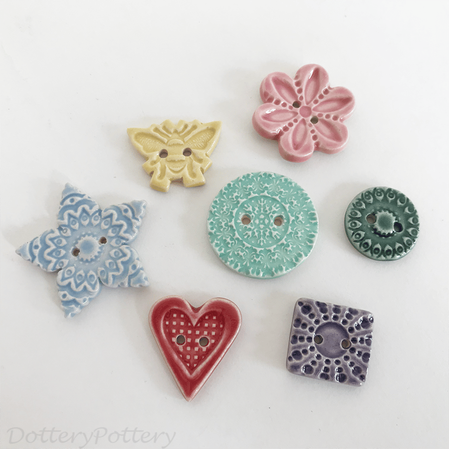 Set of seven assorted handmade ceramic buttons 