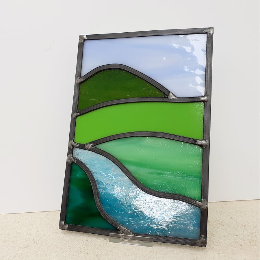 Leaded stained glass landscape panel, mountain and river scene