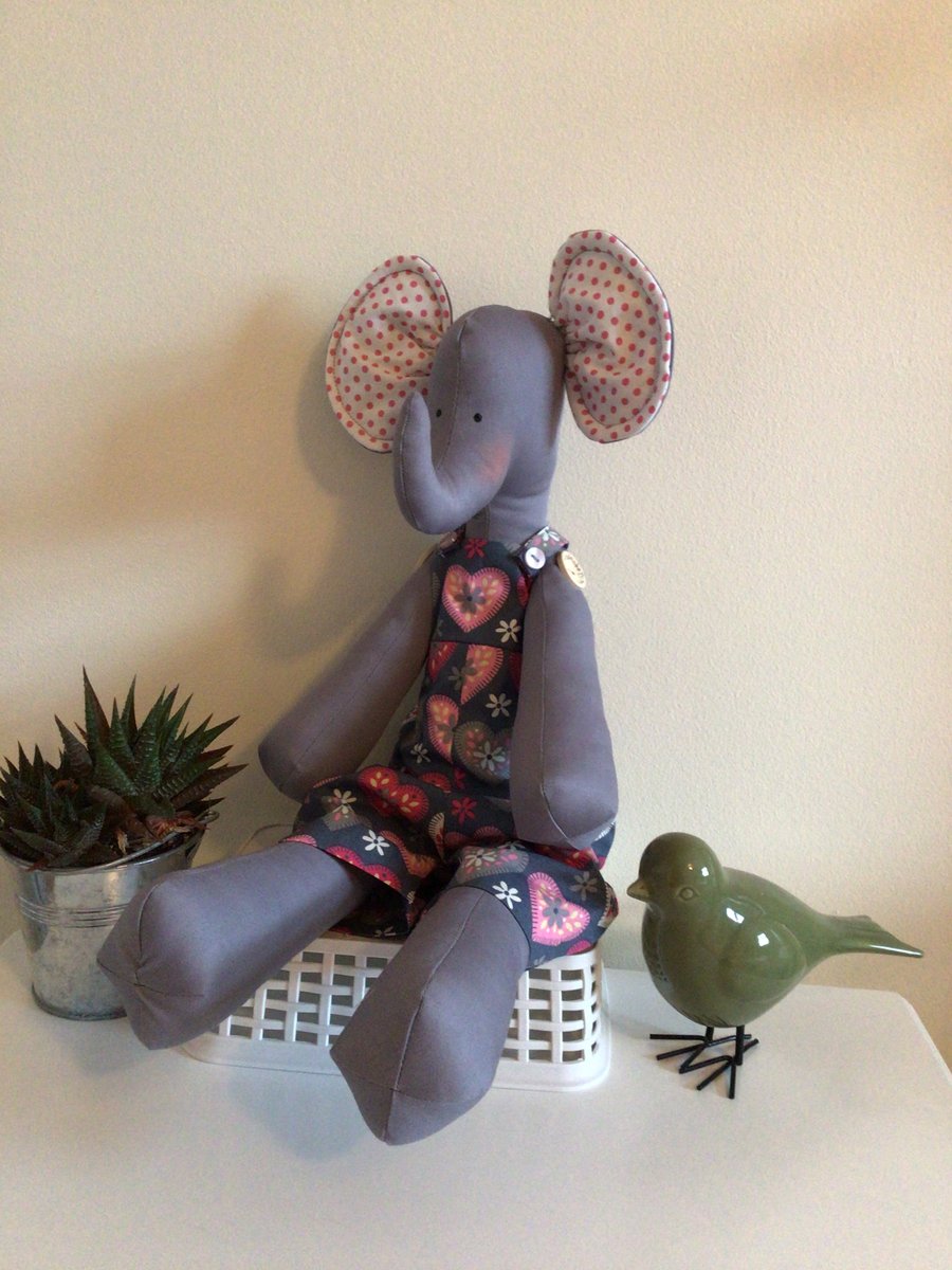 Large jointed Elephant. Collectible, pink hearts,