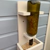 Handmade recycled bottle bird feeder