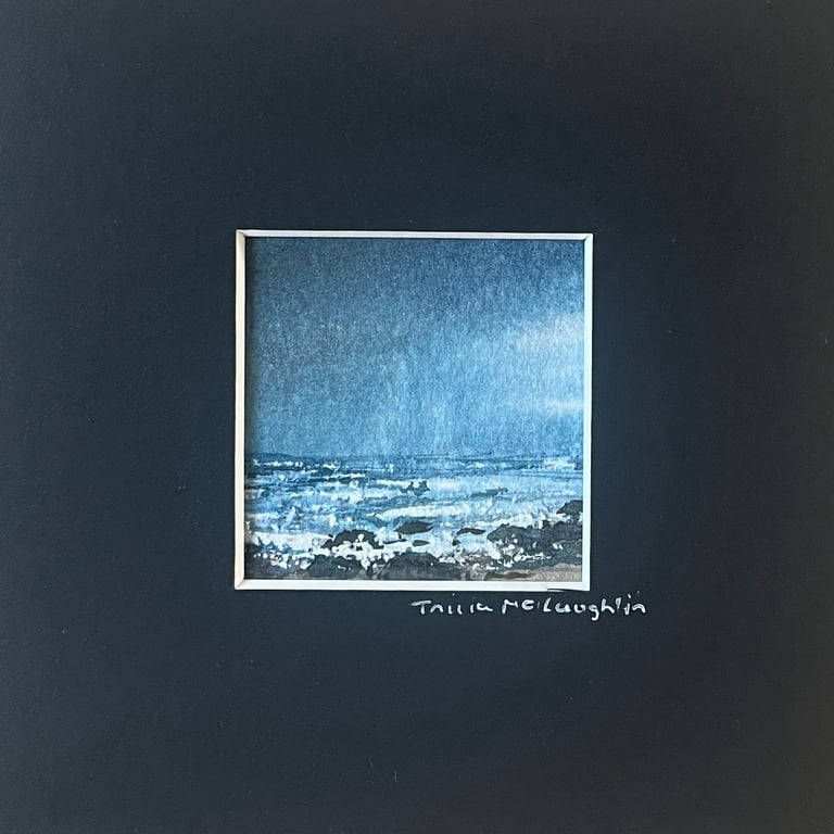 Tiny watercolour seascape in a black mount