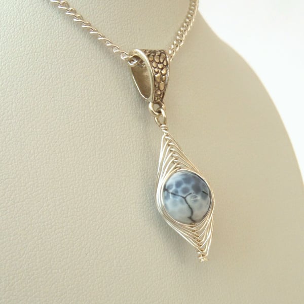 Wire wrapped necklace with blue fire agate