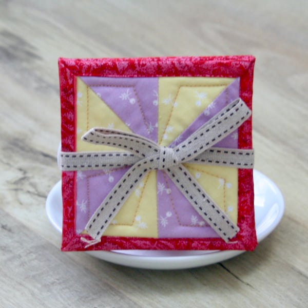 Set of Four Yellow and Purple Spring Flowers and Red Pinwheel Coasters