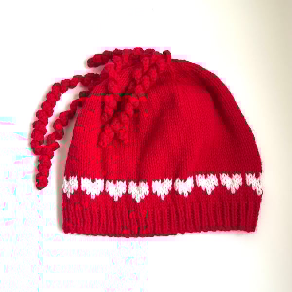 ‘Love is in the hair!’ Hand knitted beanie with hearts 