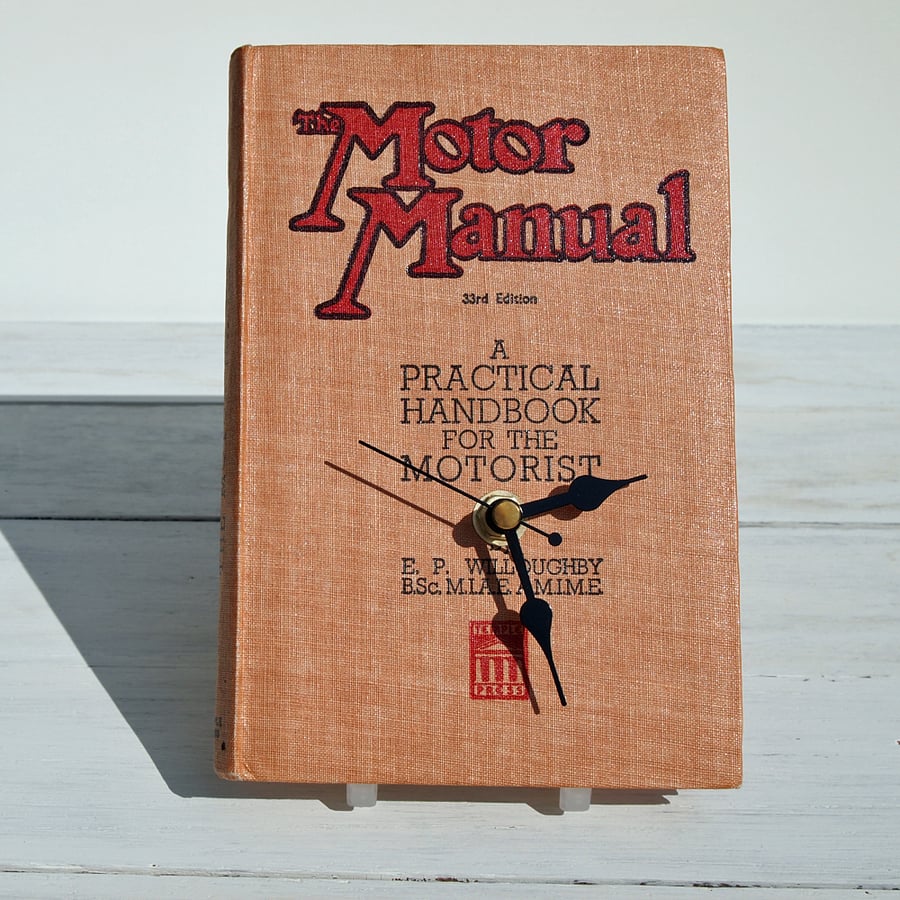 Clock upcycled from a vintage book. The Motor Manual 1948