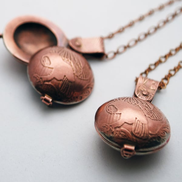 copper swivel owl locket