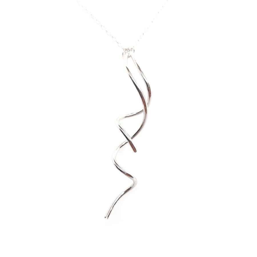 Silver double curl pendant necklace.