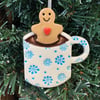 Ceramic Christmas decoration gingerbread man in a mug 