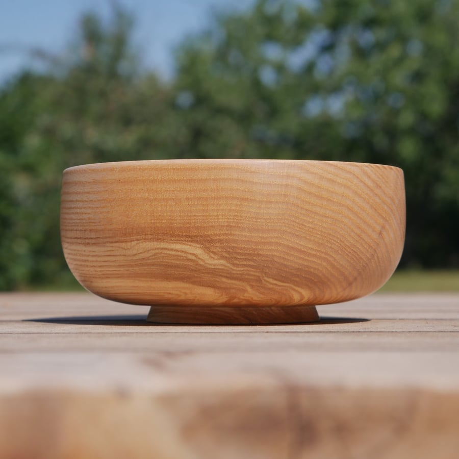 Small hand-turned decorative ash wooden bowl