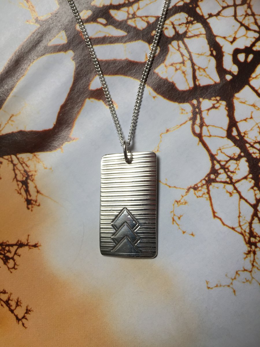 Oblong art deco silver chevron design necklace